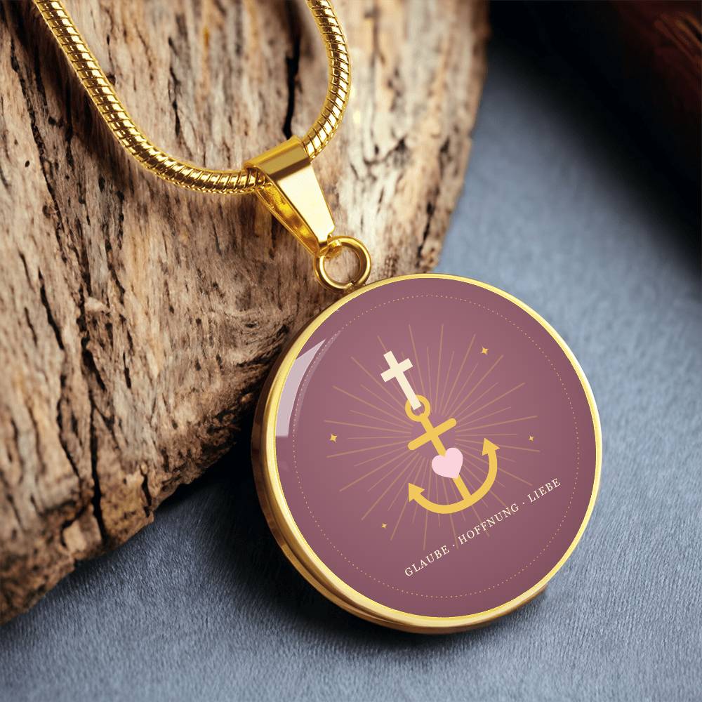 Rosa Herz im Zentrum des goldenen Ankers mit Kreuz – Symbol für Glaube, Hoffnung und Liebe